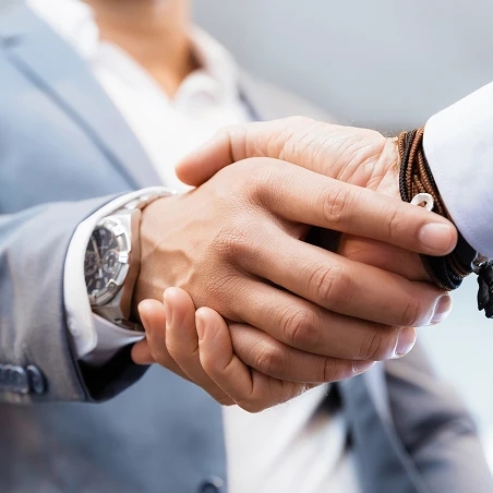 two men shaking hands